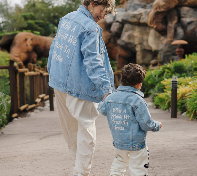 People wearing denim jackets outdoors